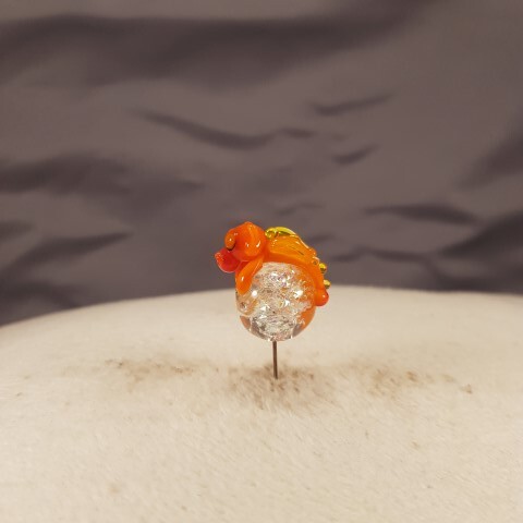 Sleeping orange dragon on shiny ball - Image 3