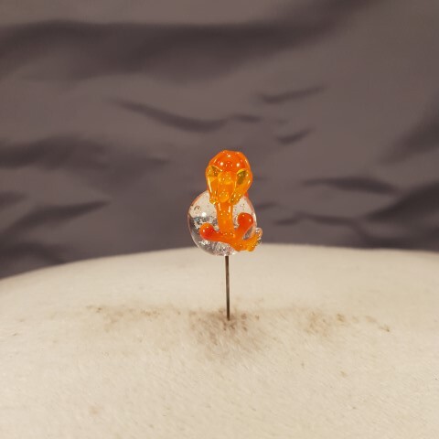 Sleeping orange dragon on shiny ball - Image 2